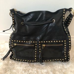 Black leather bag with gold studs